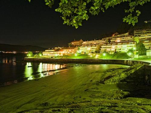 Hotel Corcubion Playa De Quenxe Exterior foto